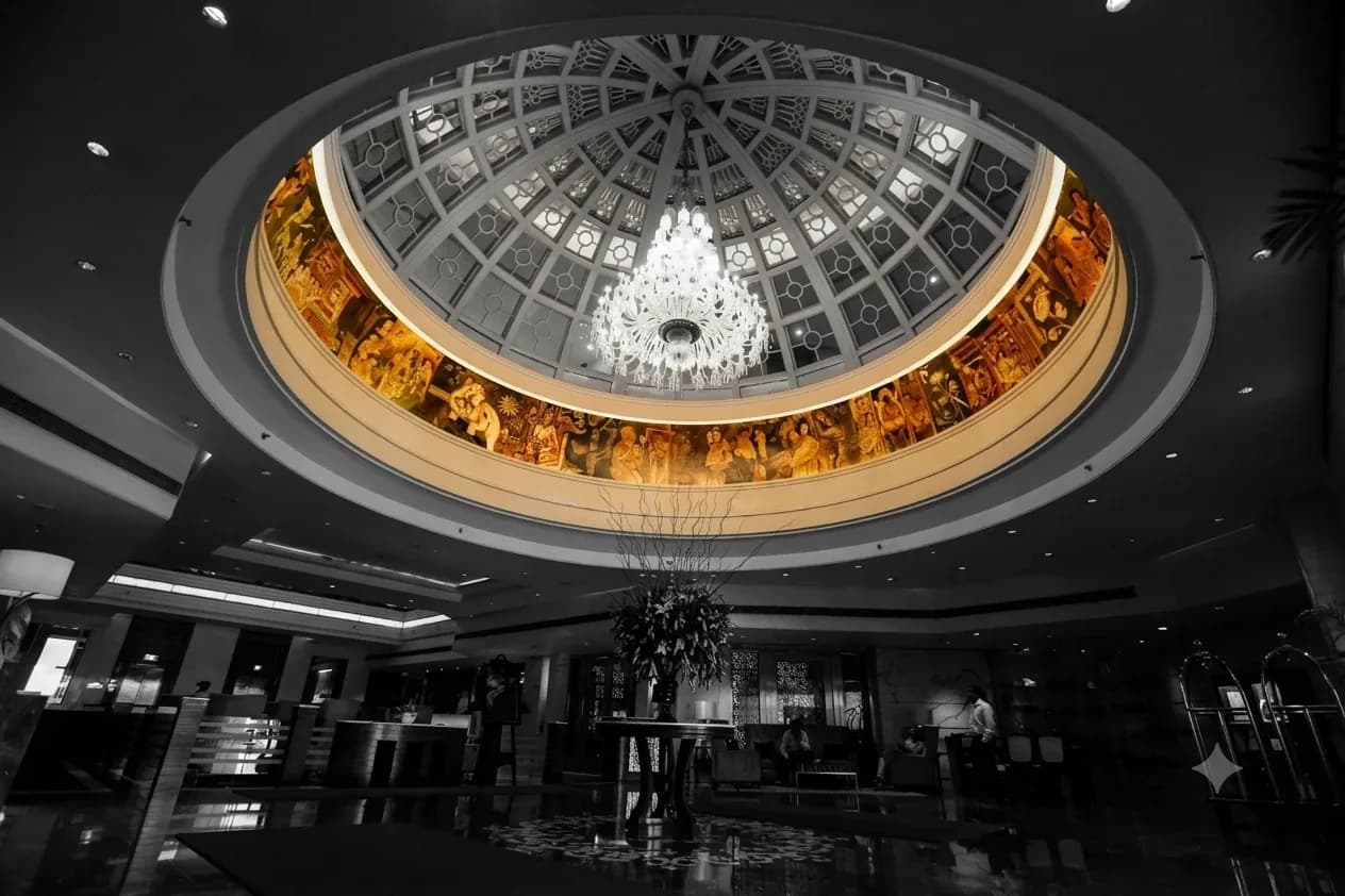 The lobby's painted dome and crystal chandelier